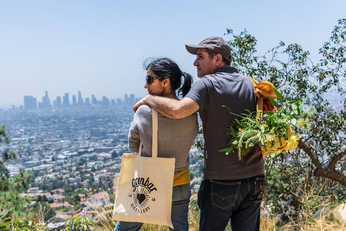 Greenbar Distillery owners Melkon and Litty overlooking the city of Los Angeles